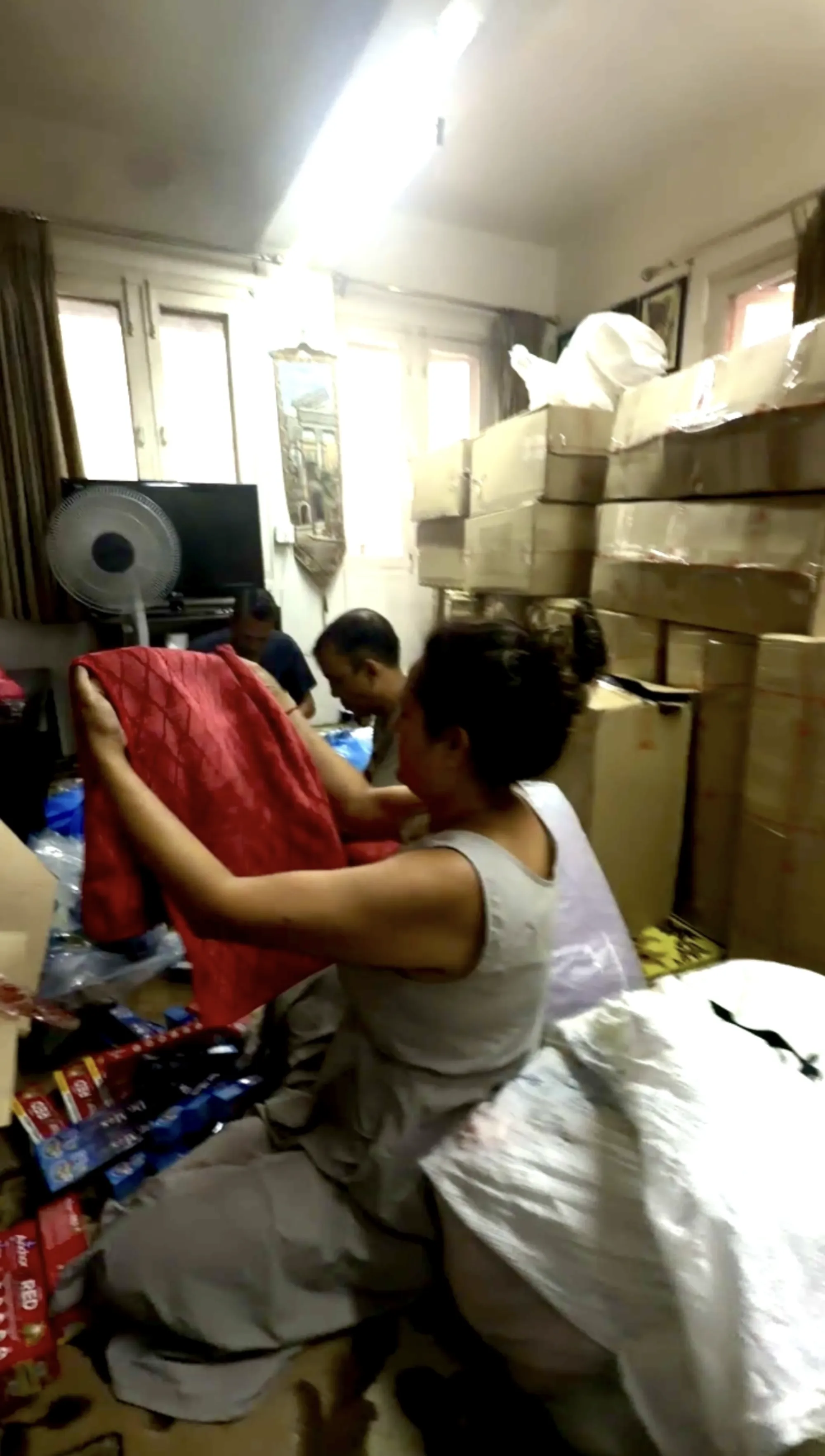 Sorting donated goods in Kathmandu