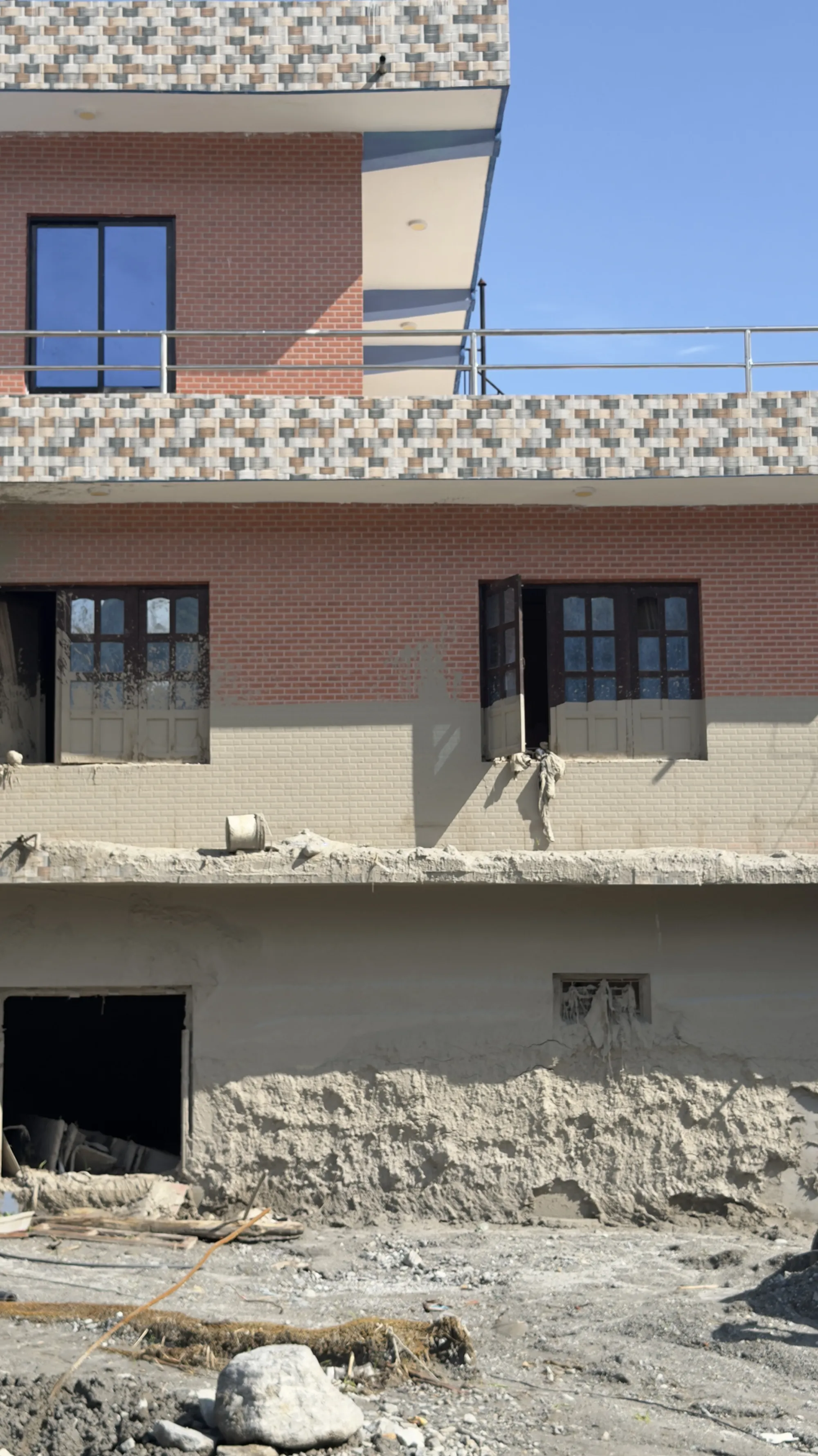 The high mud line left on a building by the flood